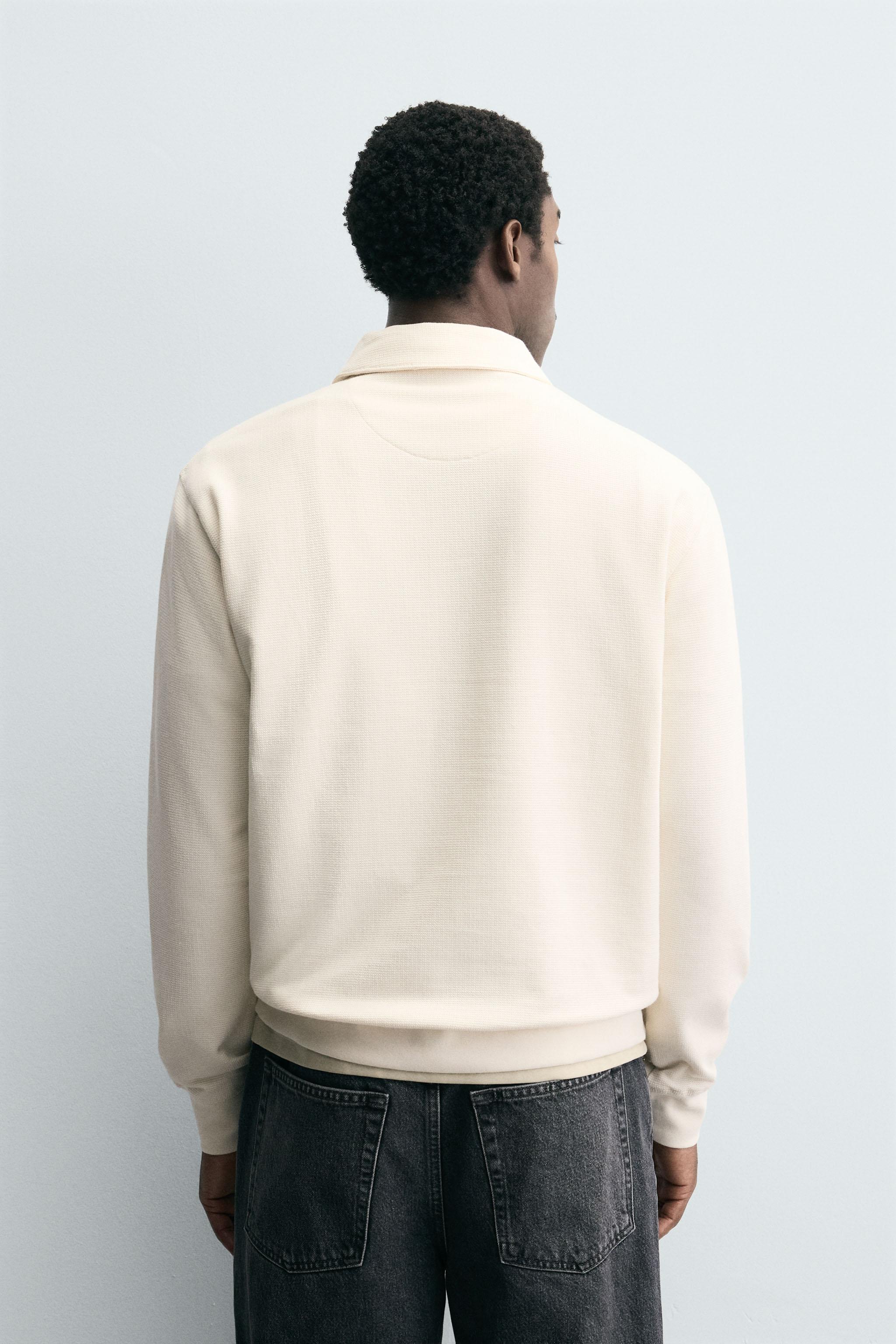 POLO STRUCTURÉ À ZIP